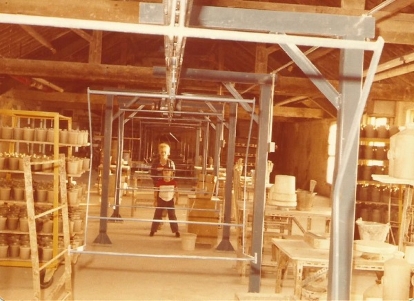 Pearsons Jolley room with the new conveyor partly installed. The two children are the daughter and son of Maurice Gill. - Lesley Foulkes