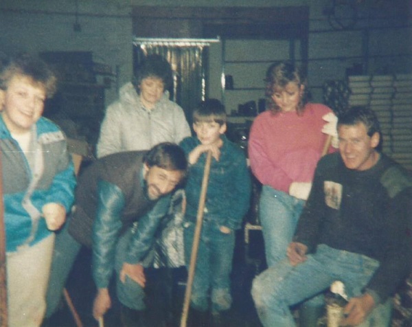 Sweeping up after the flooding. 1980-81 - Lesley Foulkes