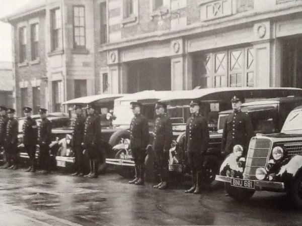 A police parade, including a Ford Pilot and Fordson vans, 1920s. - Alan Taylor