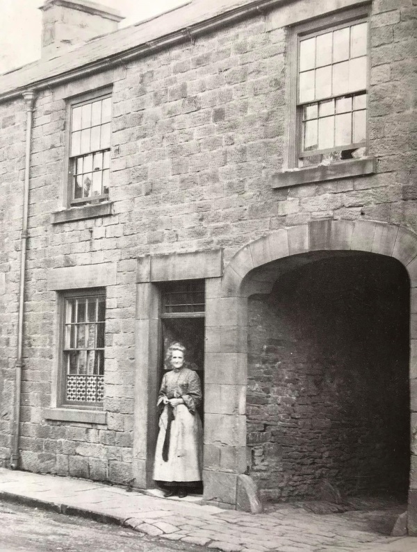 House on the north Sid right of Saltergate, c. 1900. This photograph shows the entrance to the yard leading to the sawmill. - Alan Taylor