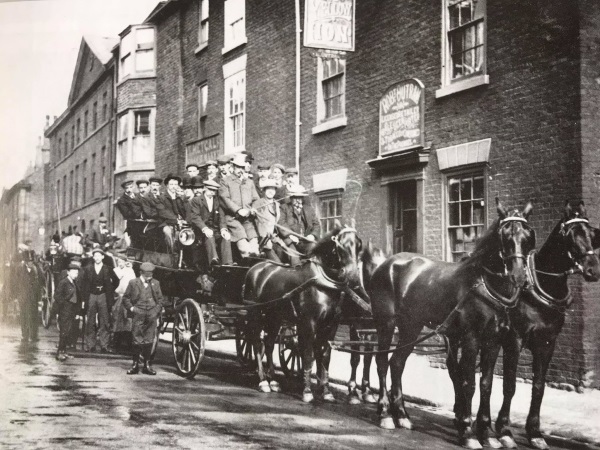 Coach and horses outside the Yellow Lion Public House, Saltergate, c. 1900. -Alan Taylor