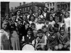 Sunday School children from The Gospel Mission Church in Brampton wait to set off from the Market Place for the procession around town.